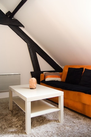 Suite, Sauna | Living area | Flat-screen TV