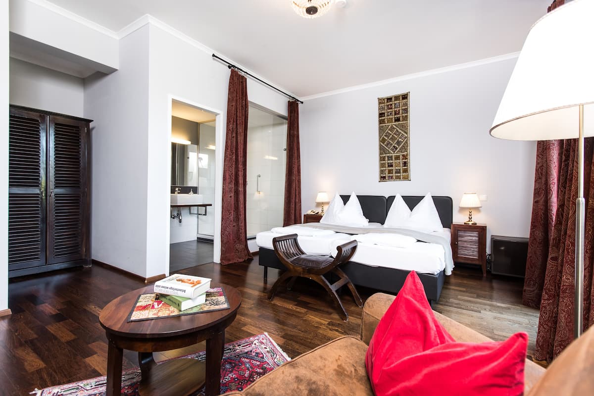 Studio Deluks | Seprai antialergi, minibar, brankas, dan Wi-Fi gratis