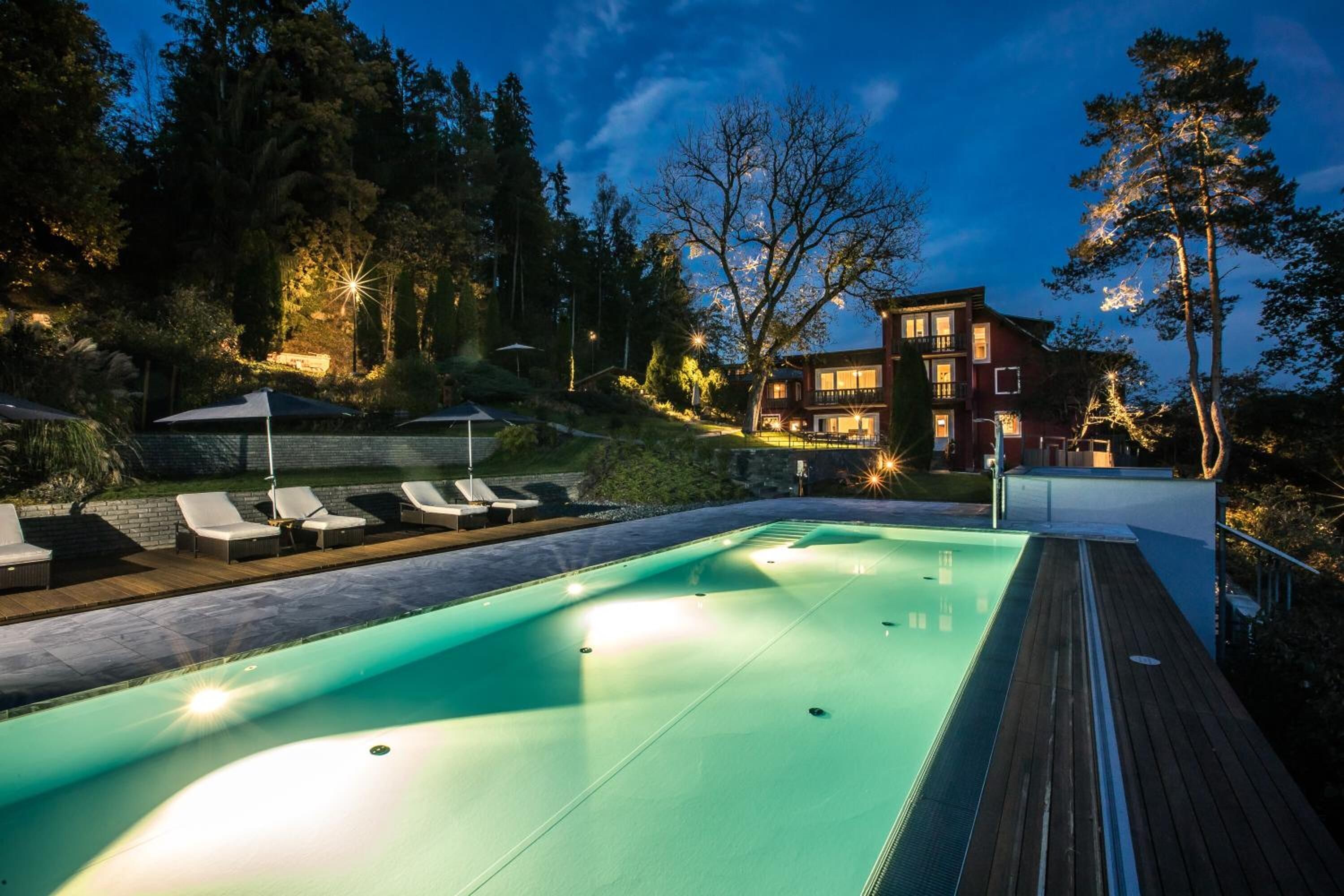 outdoor pool, pool umbrellas, pool loungers