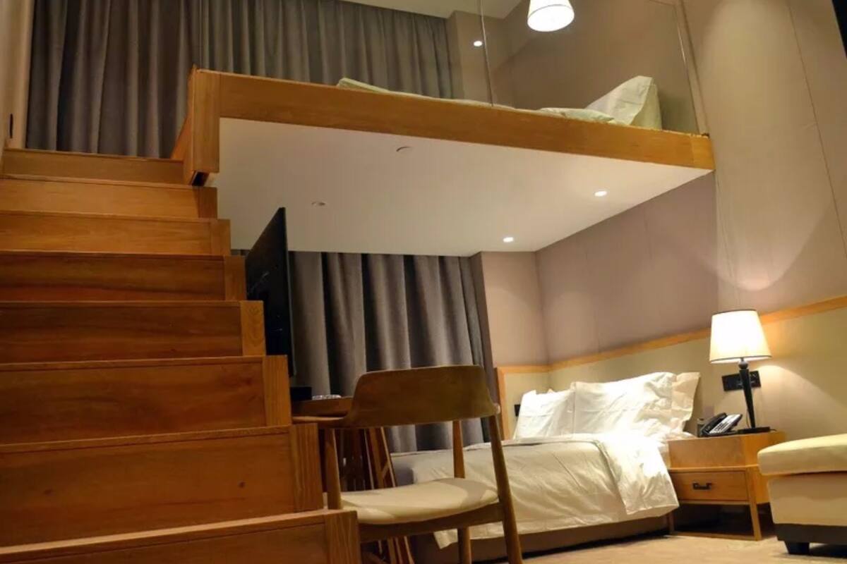 Maisonnette, 2 tweepersoonsbedden | Een minibar, een kluis op de kamer, een bureau, verduisterende gordijnen