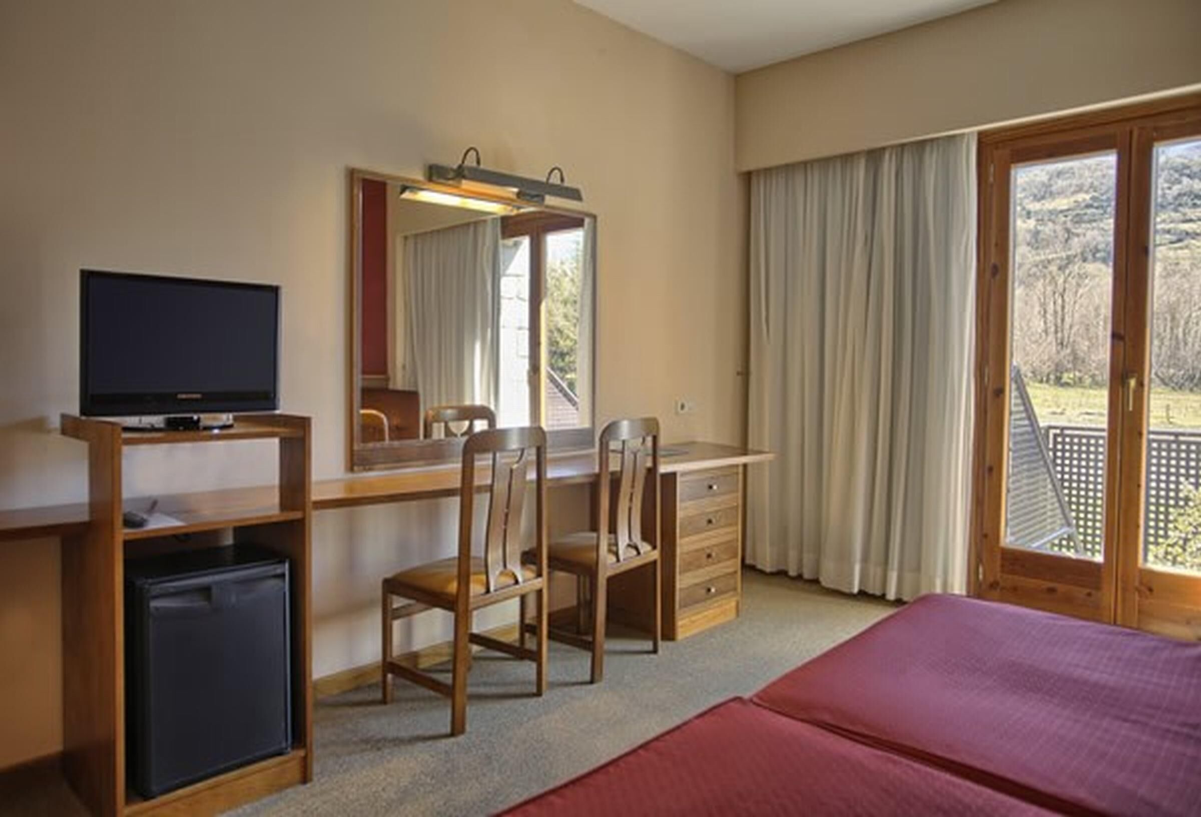 Minibar, desk, blackout drapes, soundproofing