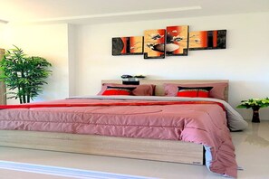 Apartment with Balcony | 1 bedroom, in-room safe, individually decorated, blackout drapes