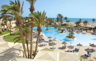 Indoor pool, 3 outdoor pools, open 6 AM to 7 PM, pool umbrellas