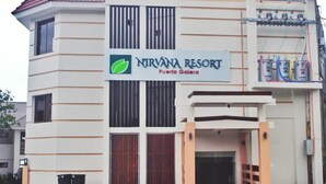 A building with a sign reading "Nirvana Resort Puerto Galera". - Nirvana Resort (Puerto Galera)