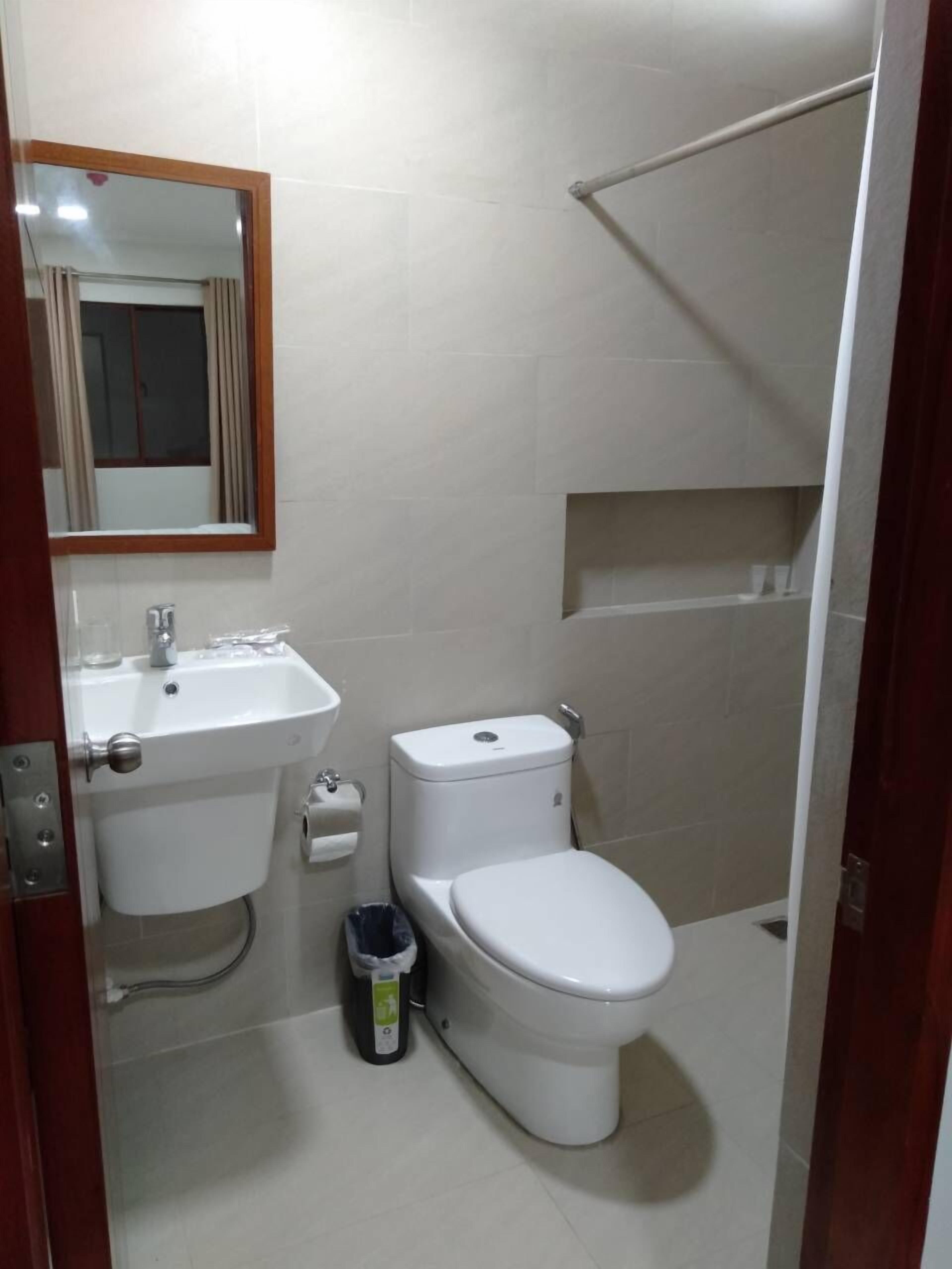 junior suite, 1 king bed, non smoking, beach view | bathroom | shower, free toiletries, hair dryer, slippers