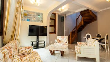 Suite, 2 Bedrooms | Living area | Flat-screen TV