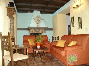 House, 3 Bedrooms, Private Pool (Molino) | Living area | Flat-screen TV, fireplace - Cortijo Molino Los Justos (Algarinejo)