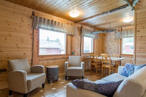 Apartment, 1 Bedroom, Sauna | Living area | Flat-screen TV, fireplace, DVD player - Ylläs Log Cabins (Kolari)