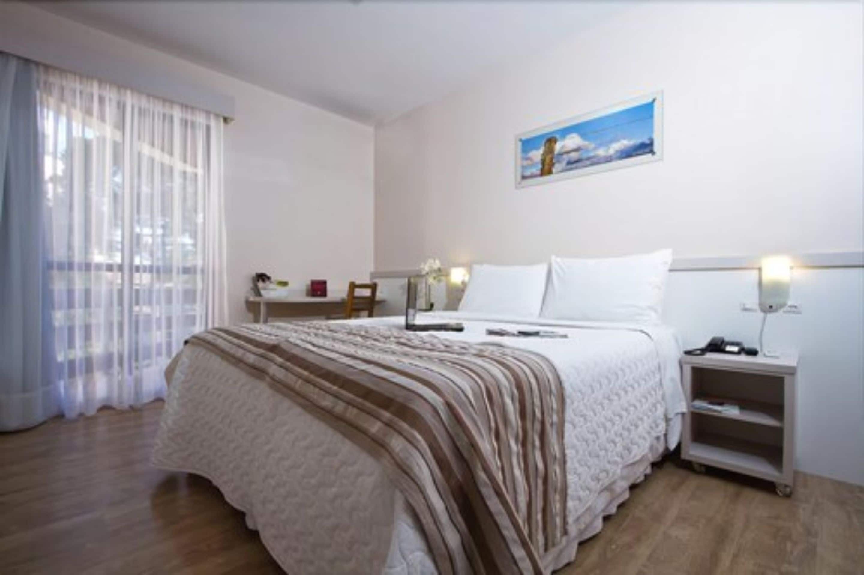standard double room | in-room safe, desk, blackout curtains, free cots/infant beds
