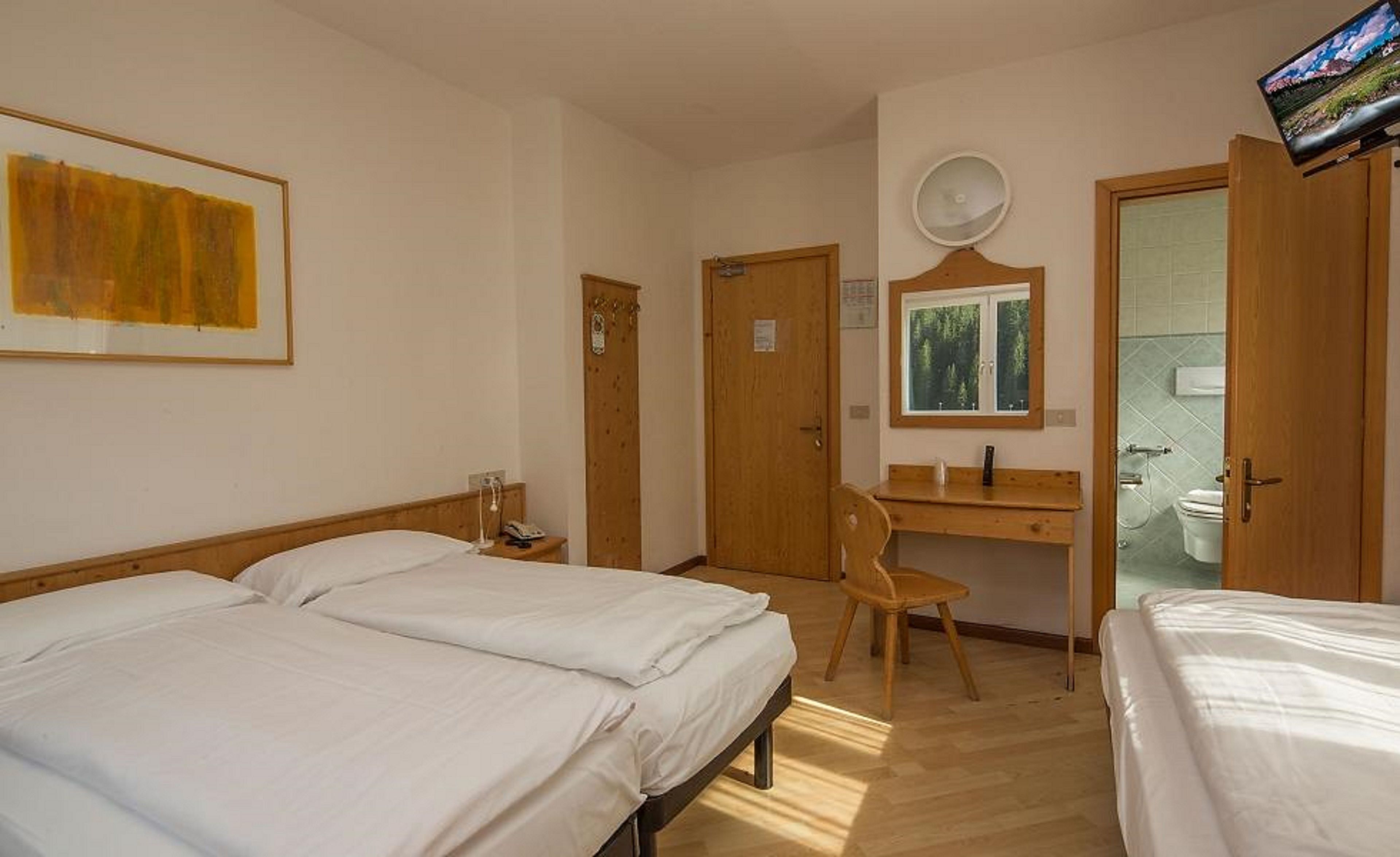 triple room | in-room safe, desk, blackout curtains, free wifi