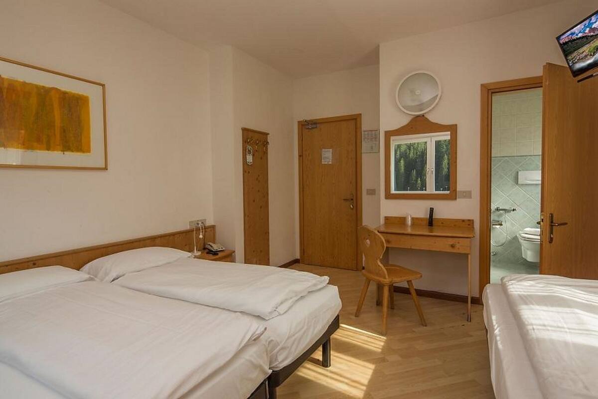triple room | in-room safe, desk, blackout curtains, free wifi