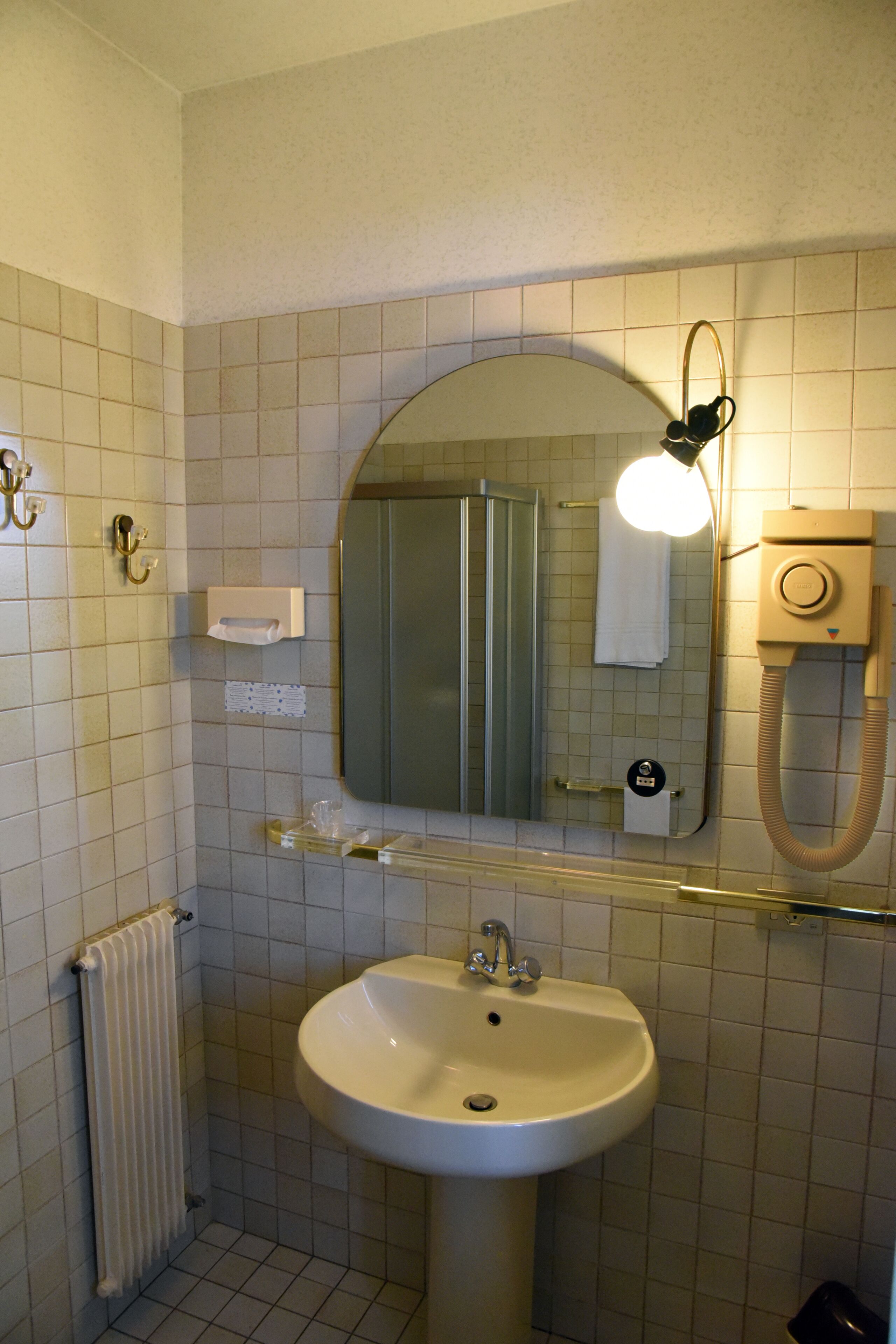 economy room | bathroom | shower, free toiletries, hair dryer, bathrobes