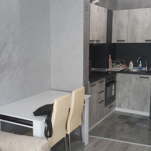 Standard Apartment, 1 Bedroom | Private kitchen | Fridge, microwave, oven, stovetop - Lubata Apartments (Sofia)