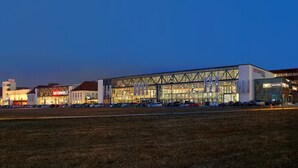 A modern building with large glass windows and a sign that reads "MOTOWORLD". - V8 Hotel Motorworld Region Stuttgart, BW Premier Collection (Boeblingen)