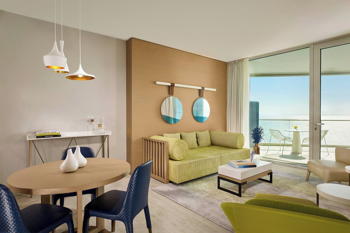 Family Suite, 2 Bedrooms, Balcony, Sea View | Living area | LED TV
