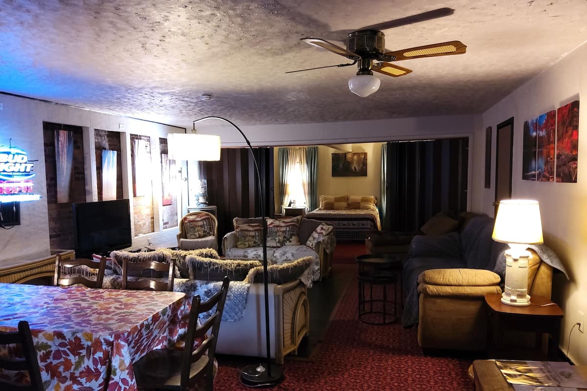 Family Suite, 3 Bedrooms, Non Smoking | Living area | 32-inch flat-screen TV with cable channels, TV