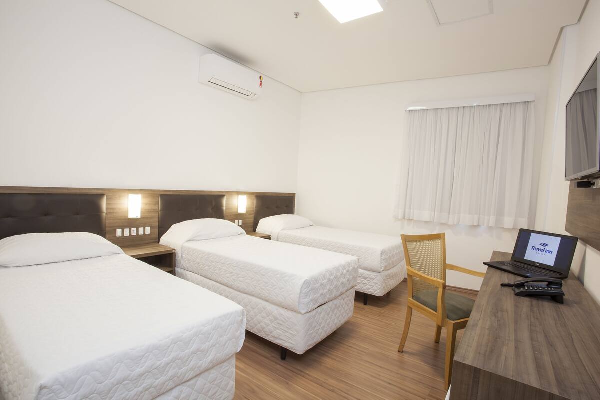 Standard Triple Room, 3 Twin Beds | Minibar, WiFi (free), bed sheets