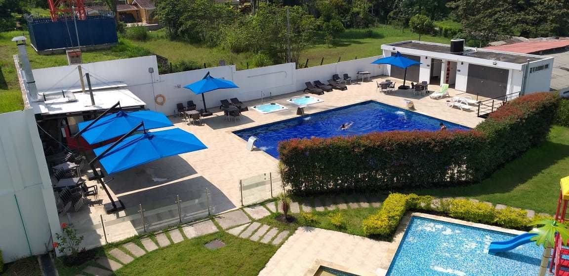 Outdoor pool, open 10:00 AM to 5:00 PM, pool umbrellas, sun loungers