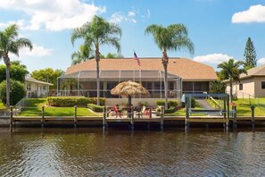 Exterior - Pretty Waterfront Home w/Heated Pool/Spa + Tiki (Cape Coral)