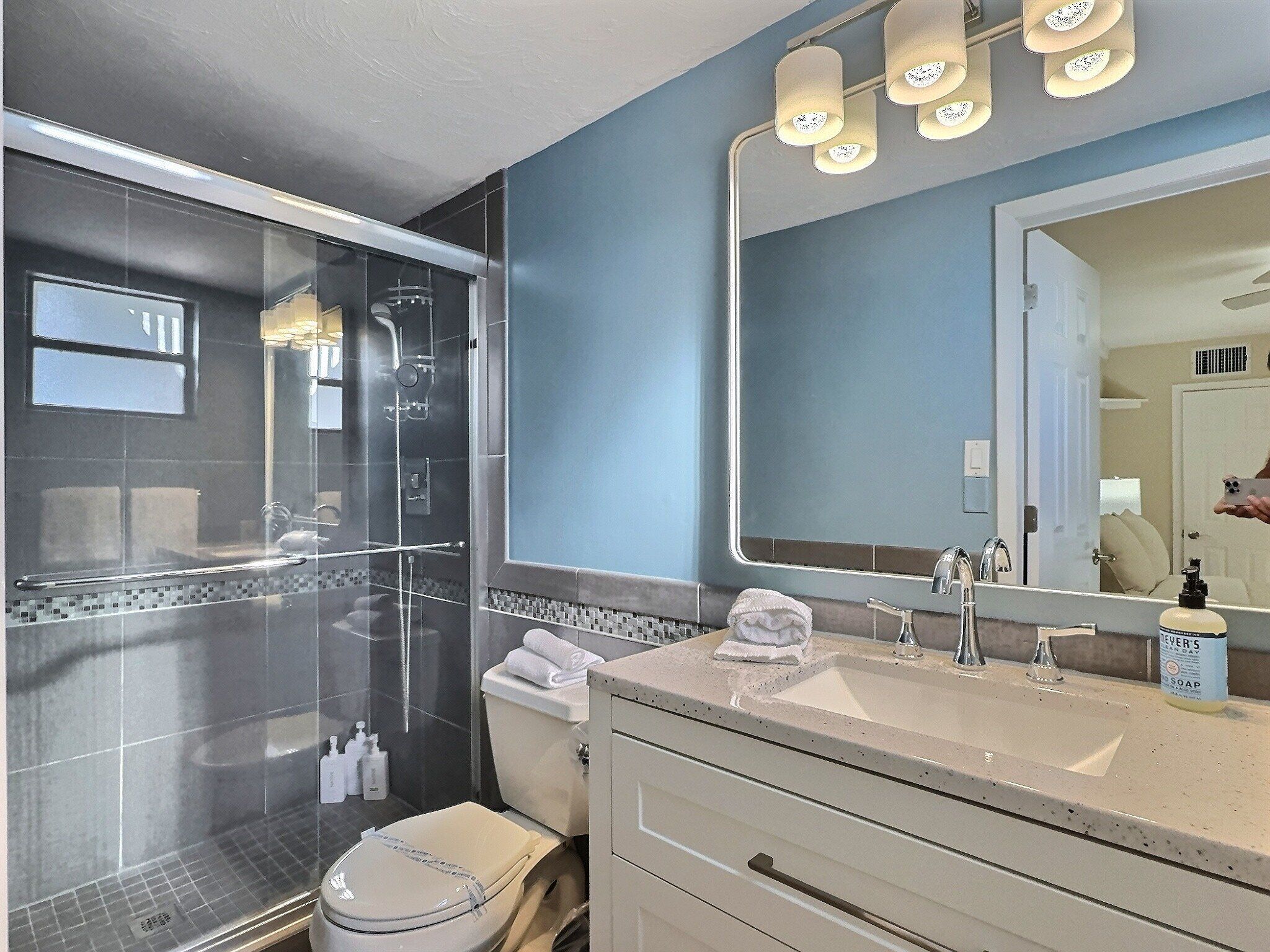 Shower, hair dryer, towels
