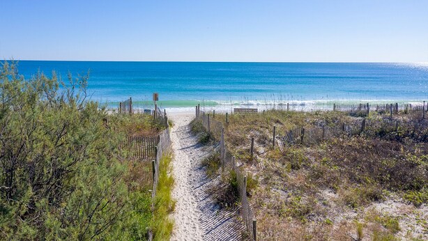 A beach path leading to the ocean with a clear view of the sea. - Relaxing townhouse with beautiful ocean views and just steps to the beach! (Wrightsville Beach)
