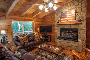 TV, fireplace - Nature Hideout with Great Location | Bear's Den Log Cabin | Hot Tub & Two Decks (Fleetwood)