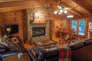 TV, fireplace - Nature Hideout with Great Location | Bear's Den Log Cabin | Hot Tub & Two Decks (Fleetwood)