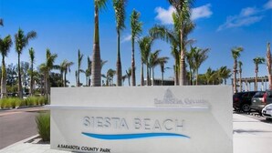 A sign for Siesta Beach, a Sarasota County Park, located at 948 Beach Road. - Beachside Studio Located Across from Main Beach and Half Mile to Village (Sarasota)