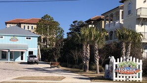 A building with a sign reading "Hokula" and a signboard for "Hokula Ice Cream, Shave Ice, Smoothies" at 405.