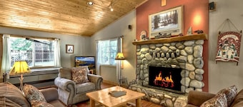 The Bear's Den Cabin set on a huge lot, lots of room to play!