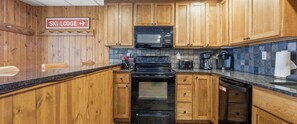Fridge, microwave, oven, stovetop - Luxurious 2BR Ski In/Ski Out #781 on Boyneland - Sleeps 6! Fall 2025 Remodel (Boyne Falls)