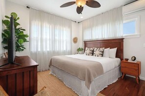 1 habitación, tabla de planchar con plancha y cuna de viaje