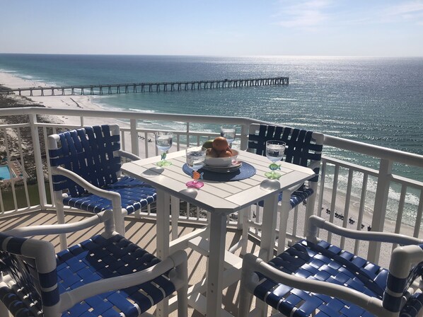 Outdoor dining - Wilson's Beach Dream: Gulf-Front 3BR End Unit, 5-Star, Sleeps 9 (Navarre)