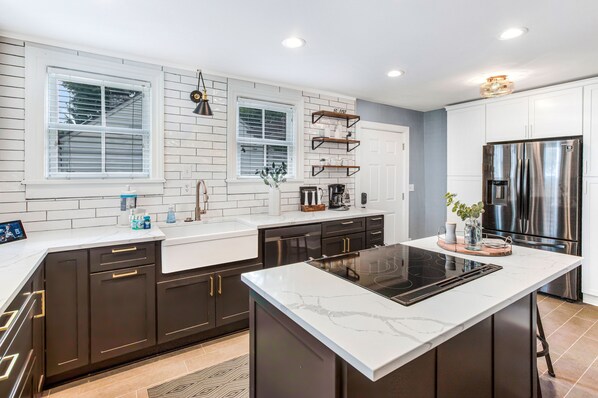 Fridge, microwave, oven, stovetop - Southern Charm w/ High-end Modern Amenities + Parking by Lucky Savannah (Savannah)