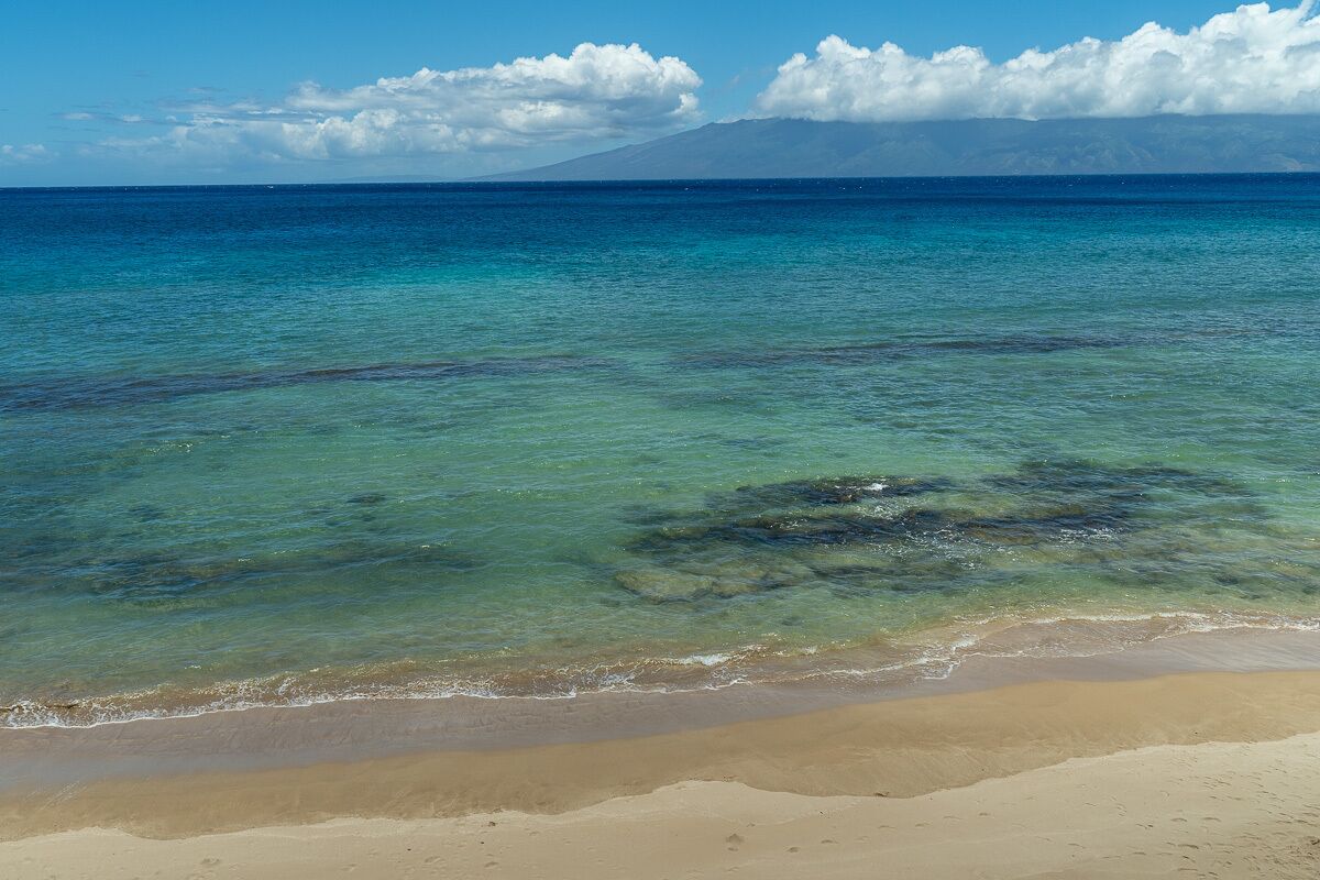 On the beach, sun loungers, beach towels