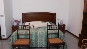 Classic Quadruple Room, Private Bathroom | Iron/ironing board, free cribs/infant beds, rollaway beds, free WiFi