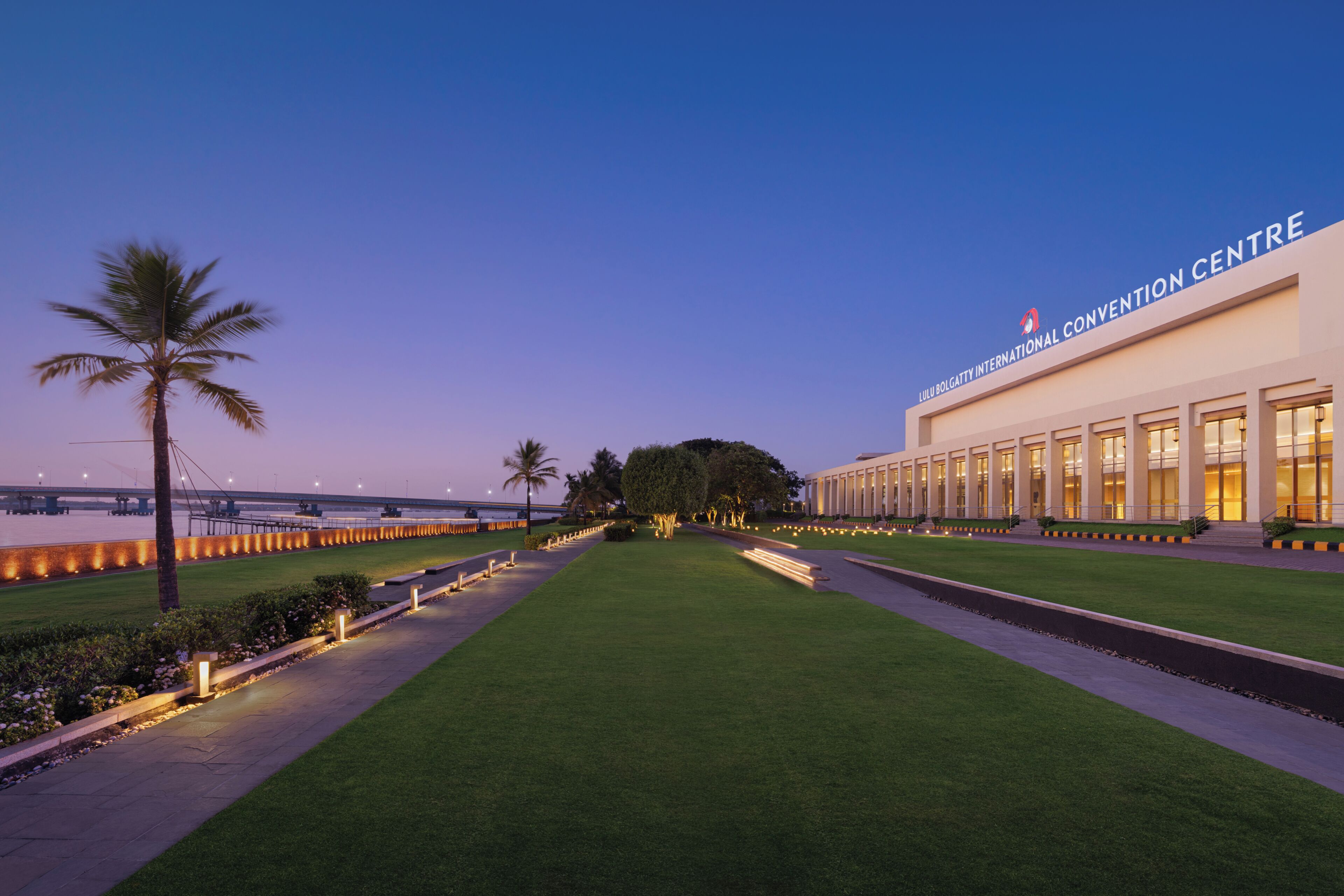 A modern building with a sign reading 'Lulu Bolgatty International Convention Centre.'