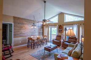 TV, fireplace, ping pong, books - River Haven on the New River | Ultimate Outdoor Living | Hot Tub, Ping Pong, & More (Fleetwood)