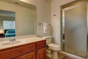 Shower, hair dryer, towels