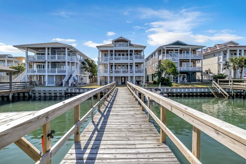 Dockside.  A Sound front home with boat slip in the heart of WB!