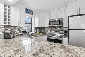 Fridge, microwave, oven, stovetop - First Floor Beachfront Studio! Walk out to Beach, Tropical Pool, Tram & Patio (Miramar Beach)