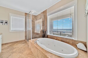 Combined shower/bathtub, towels - Lone Palm by GSVR | Charming Beachfront Retreat w/ Great Primary Bed/Bath + FREE Activities/Golf (Gulf Shores)