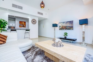 Departamento, 1 habitación | Área de sala de estar | Televisión 