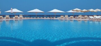 2 outdoor pools, pool umbrellas, sun loungers