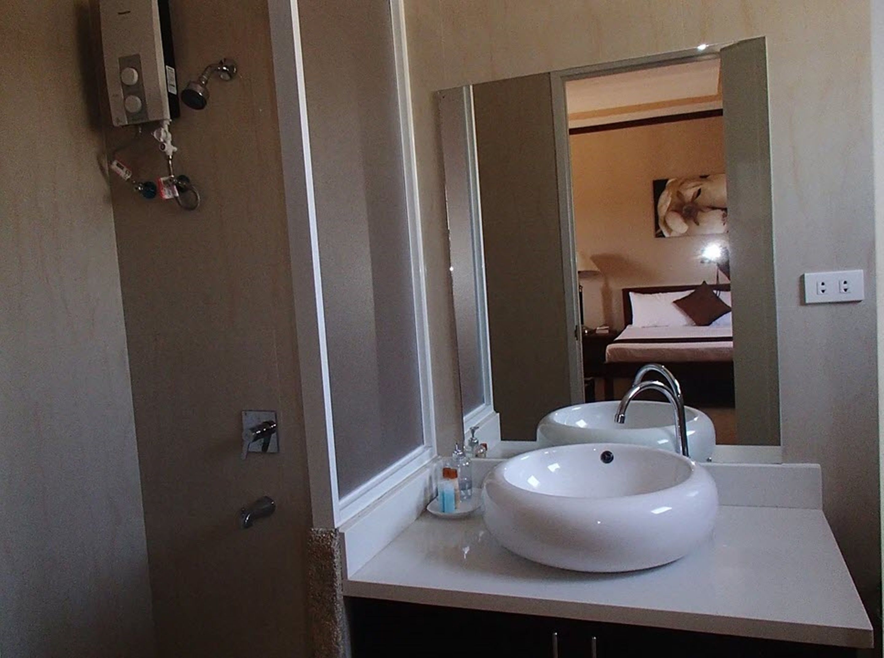 super deluxe family room | bathroom | shower, free toiletries, bidet, towels