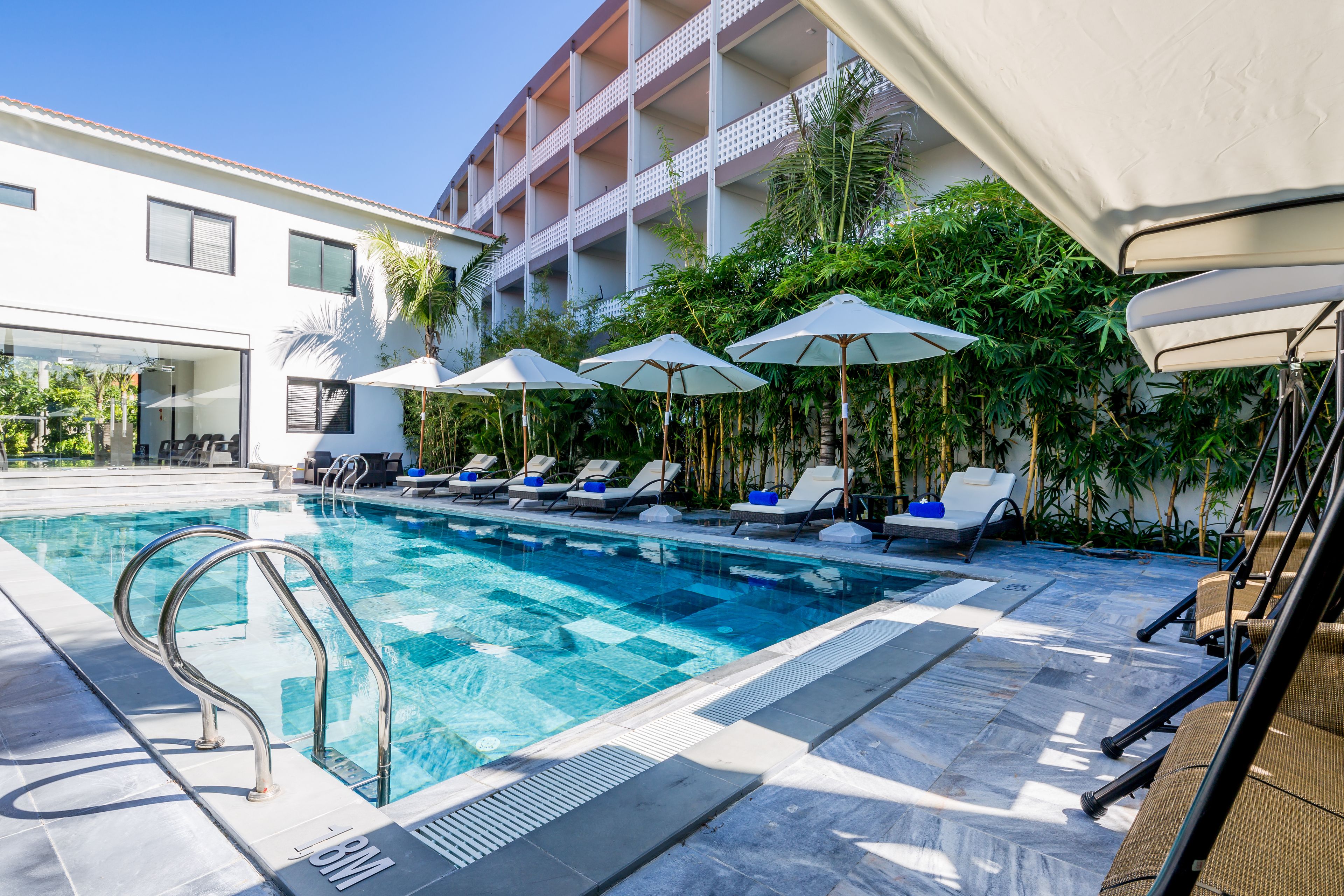 3 outdoor pools, open 6:00 AM to 6:00 PM, pool umbrellas, pool loungers