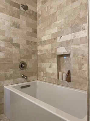 Combined shower/tub, hair dryer, towels, soap
