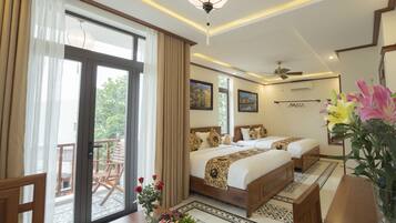 Family Room, 1 Bedroom, Garden View | Minibar, in-room safe, desk, blackout curtains