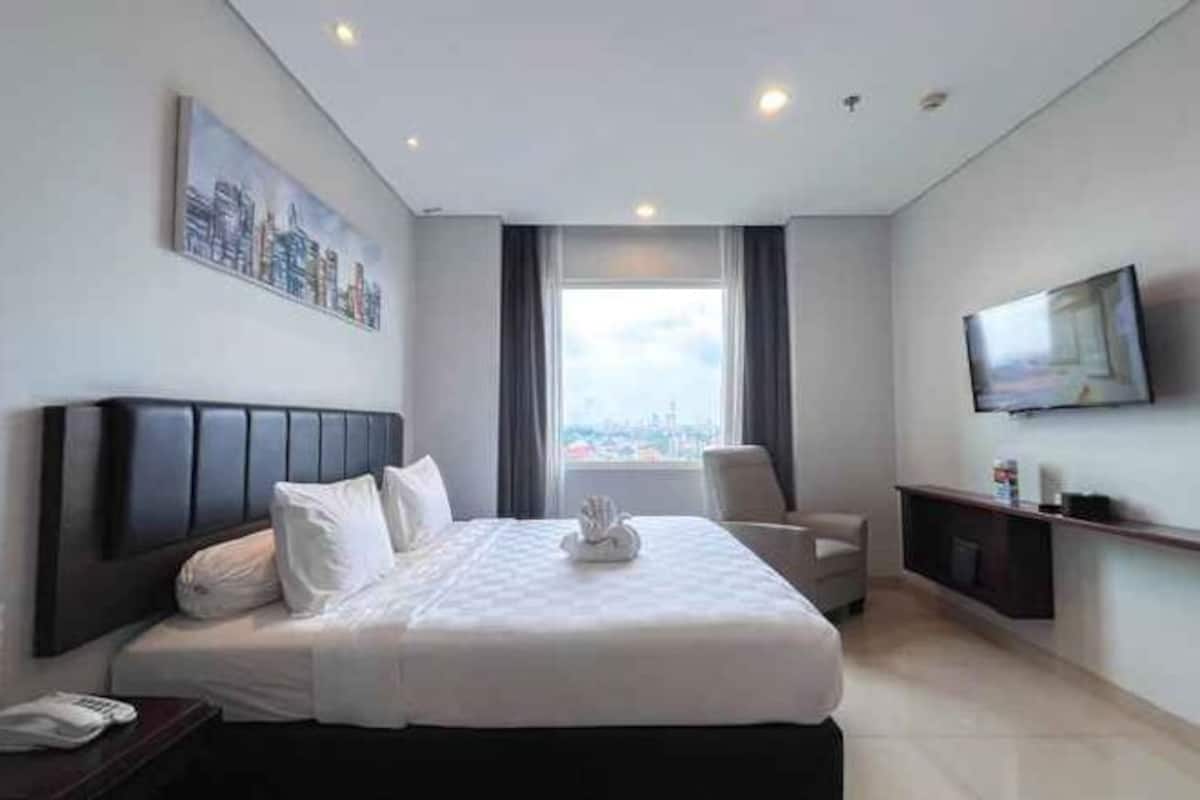 In-room safe, desk, laptop workspace, blackout curtains