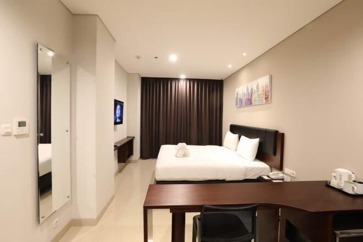 In-room safe, desk, laptop workspace, blackout curtains